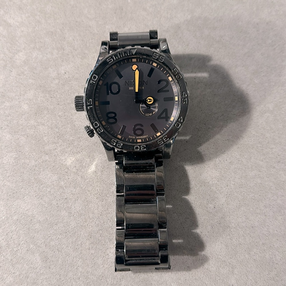 Nixon 51-30 GUN METAL WITH THE ORANGE DIAL HANDS